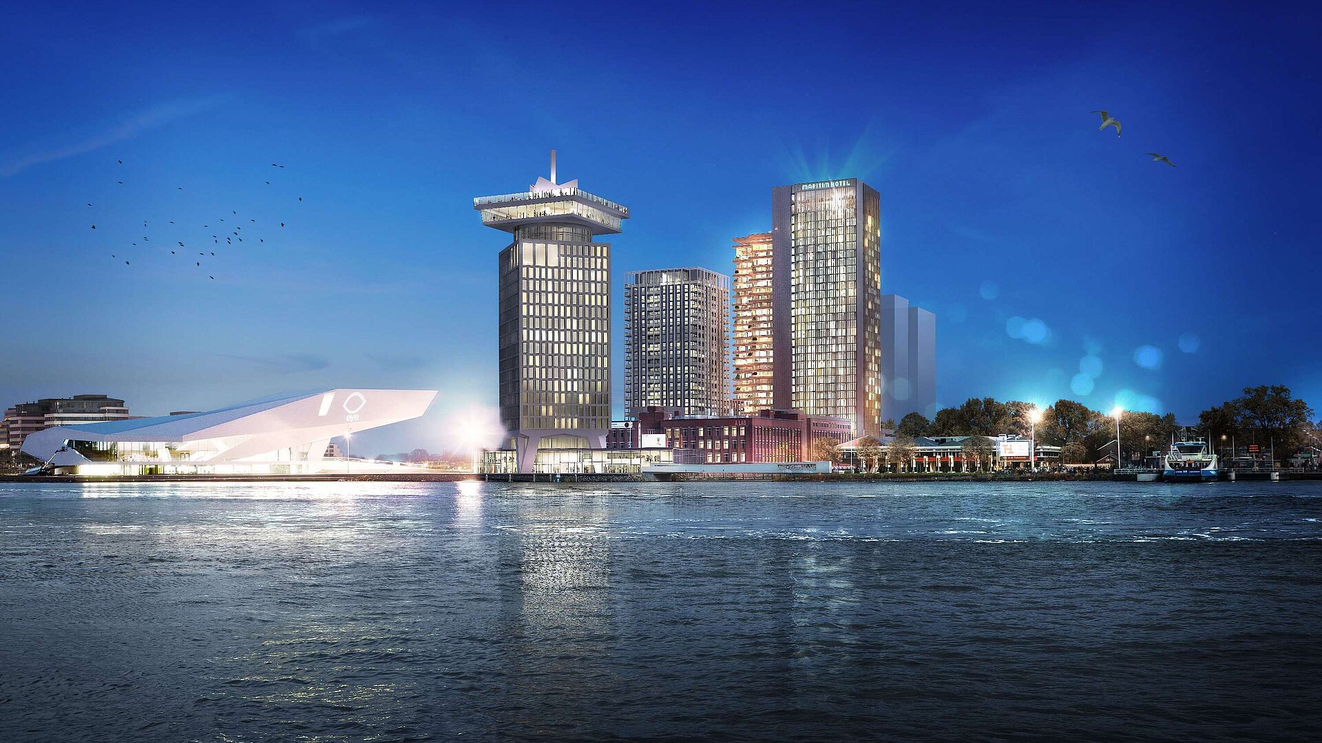 Außenansicht Maritim Hotel Amsterdam bei Nacht mit Blick auf die Skyline und den Fluss IJ